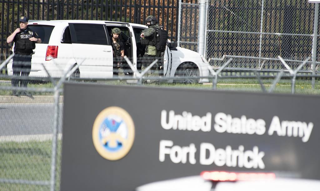 Thumbnail: Frederick Police Department officers prepare to enter Fort Detrick during an April 2021 shooting. A recent DoD inspector general report found inconsistencies in the way military installations train for active shooter situa