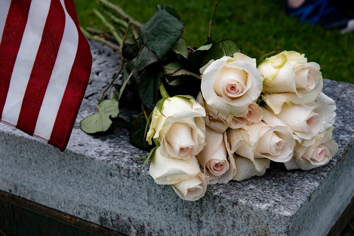 Flowers lay on a bench during a funeral at the National Memorial Cemetery of the Pacific, Honolulu. (Staff Sgt. Jamarius Fortson/Army) Military Times launches new online obituary platform