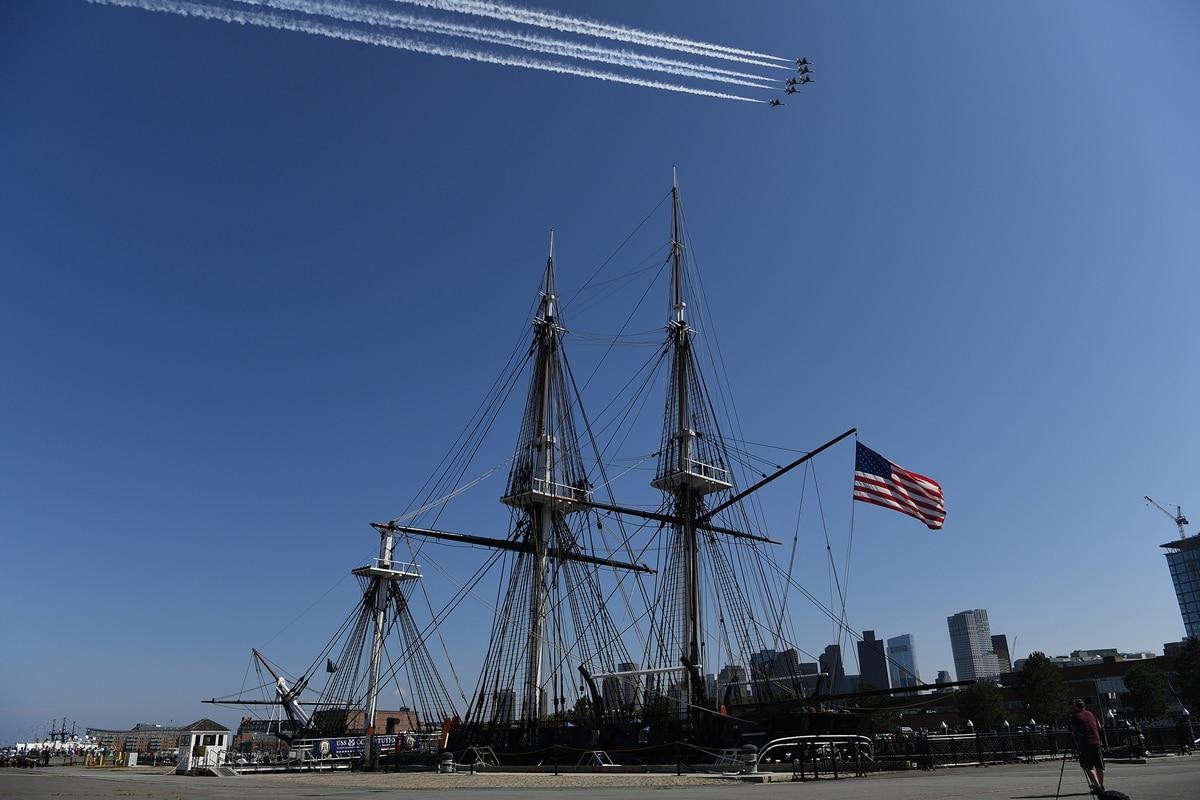 The U.S. Air Force Thunderbirds fly over the USS Constitution in Boston Harbor during a 