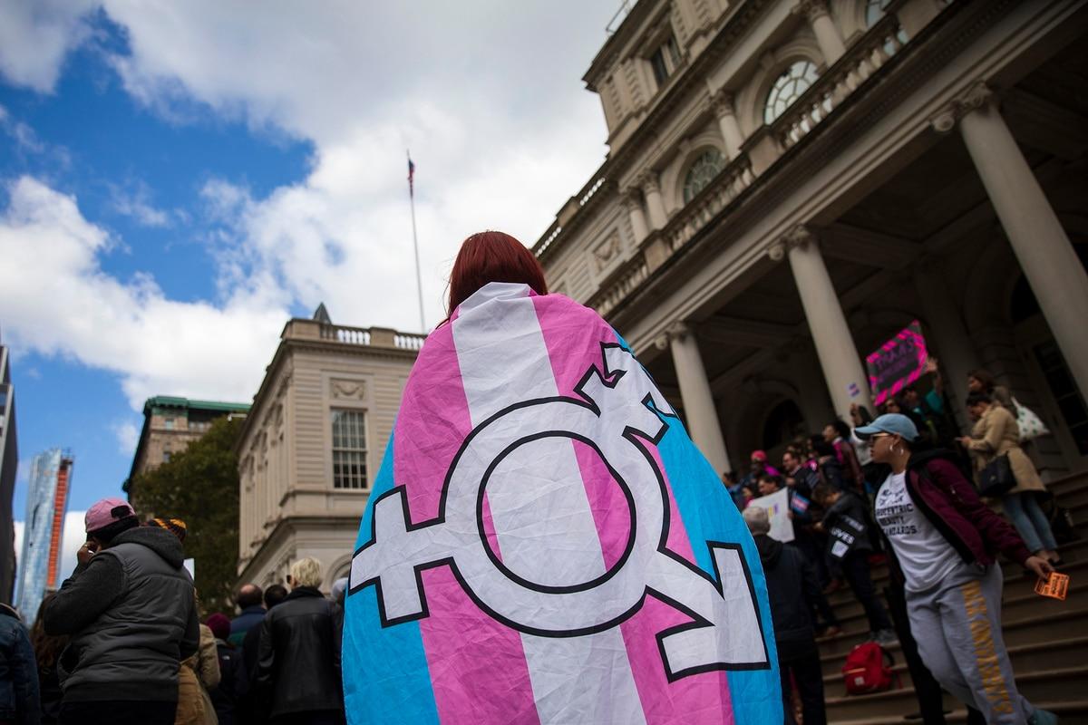LGBT activists rally in support of transgender people on the steps of New York City Hall on Oct. 24, 2018. (Drew Angerer/Getty Images)