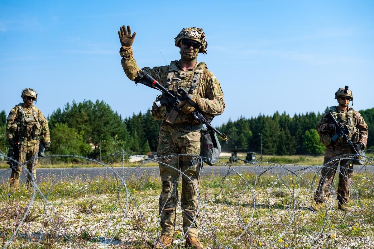 Paratroopers from the 173rd Airborne Brigade stand guard during a military exercise, Aug. 10, 2020, near Hohenfels, Germany. (Lennart Preiss/Getty Images)