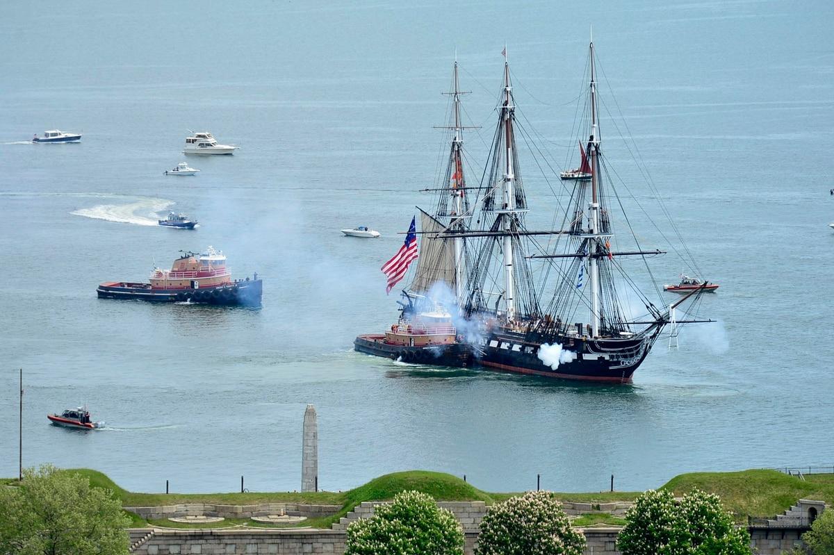 USS Constitution fires its cannons as it is tugged through Boston Harbor on May 21, 2021. (MC3 Alec Kramer/Navy) USS Constitution crew to pay respects to health care workers
