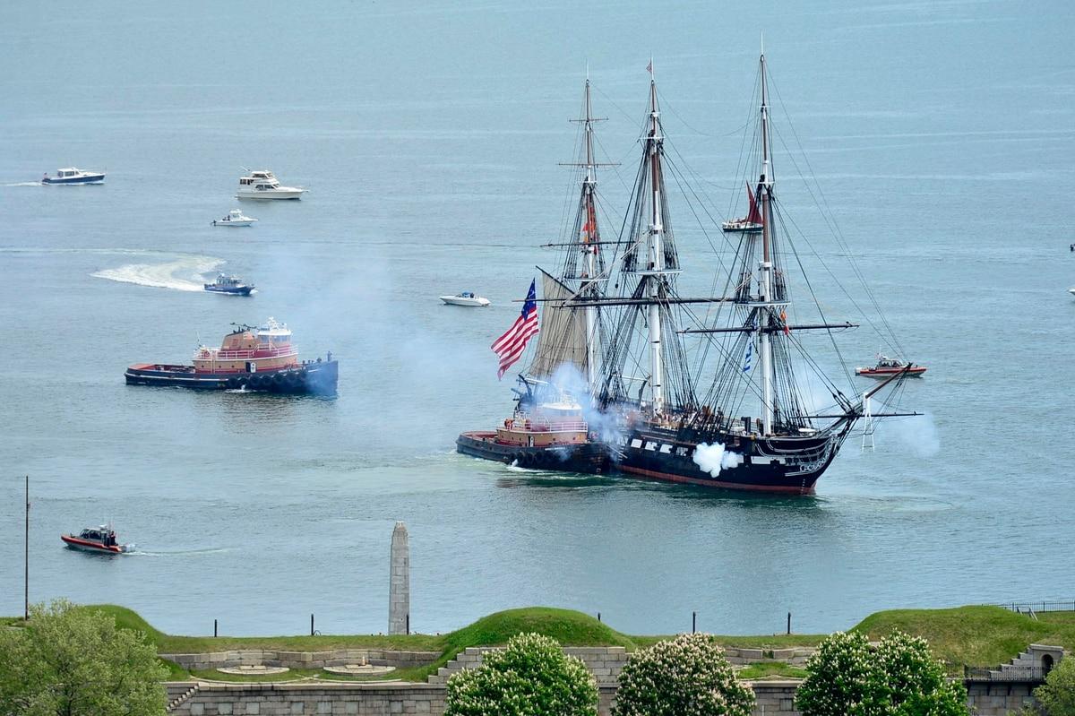 USS Constitution fires its cannons as it is tugged through Boston Harbor on May 21, 2021. (MC3 Alec Kramer/Navy) USS Constitution crew to pay respects to health care workers