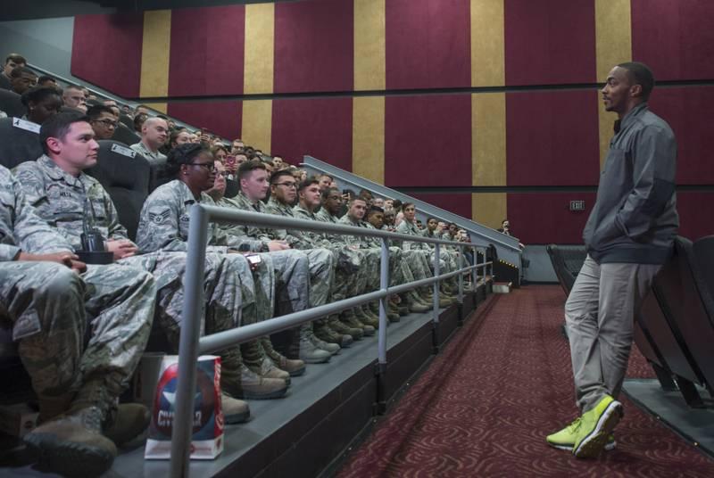 Actor Anthony Mackie addresses airmen at a movie theater in Hampton, Virginia. (Senior Airman Kayla Newman/Air Force)  Great power, great responsibility: Gen. â€˜CQâ€™ Brown & Anthony Mackie talk diversity â€˜firstsâ€™ in military, Marvel