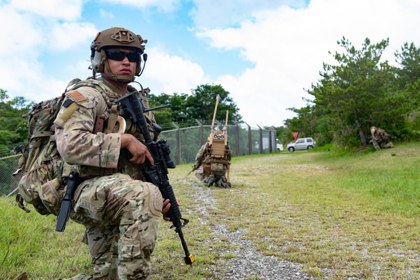 Senior Airman Miguel Ramirez, an Explosive Ordnance Disposal technician from the 18th Civil Engineer Squadron, provides security while on patrol during an Improvised Explosive Device training event on Kadena Air Base, Japa
