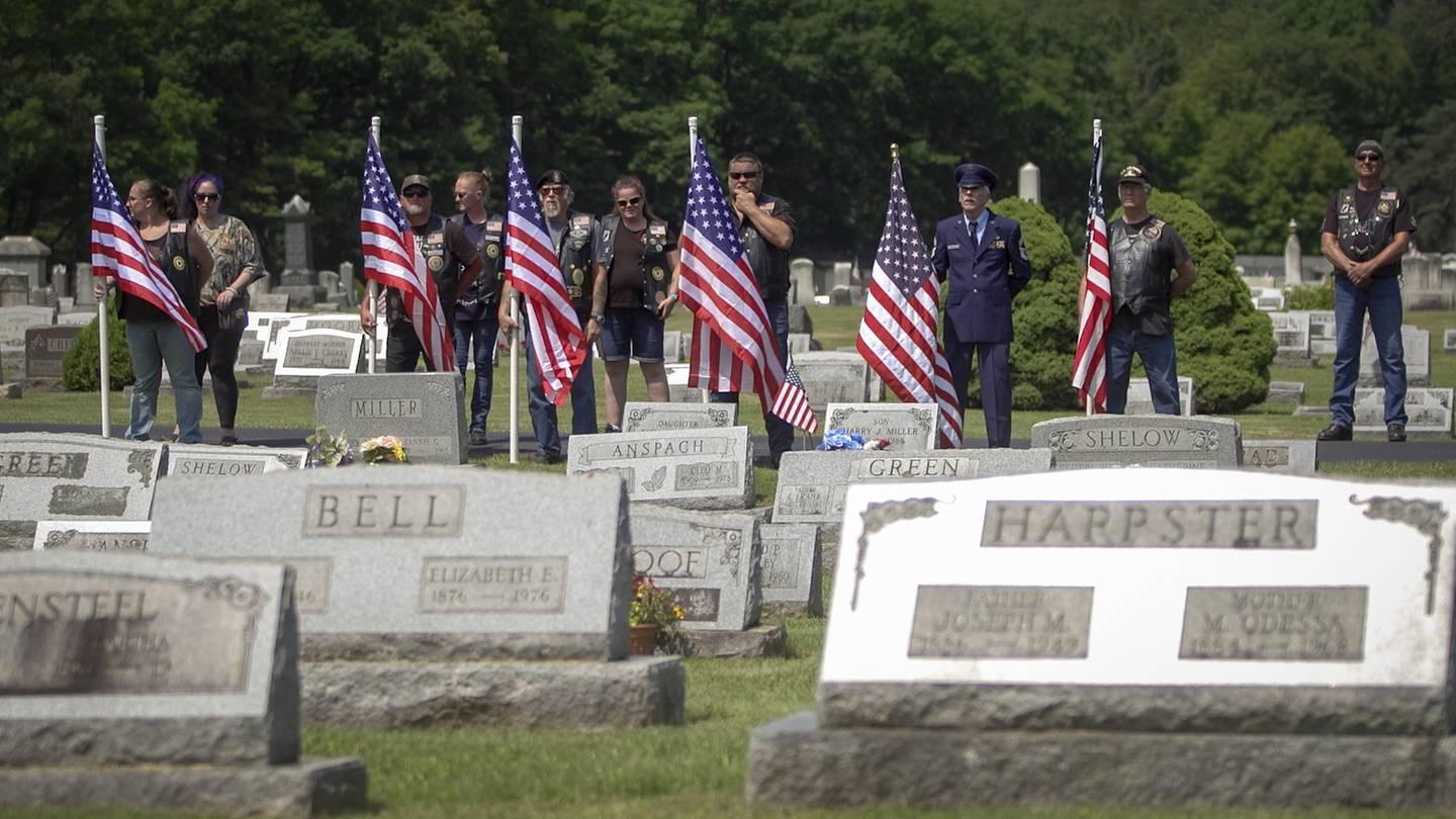 Veterans hold American flags at the funeral for Cpl. Paul Wilkins at Logan Valley Cemetery Saturday, June 16, 2021 in Bellwood, Pa. The Army declared Wilkins missing in action in July 1950 during the Korean War, and his re