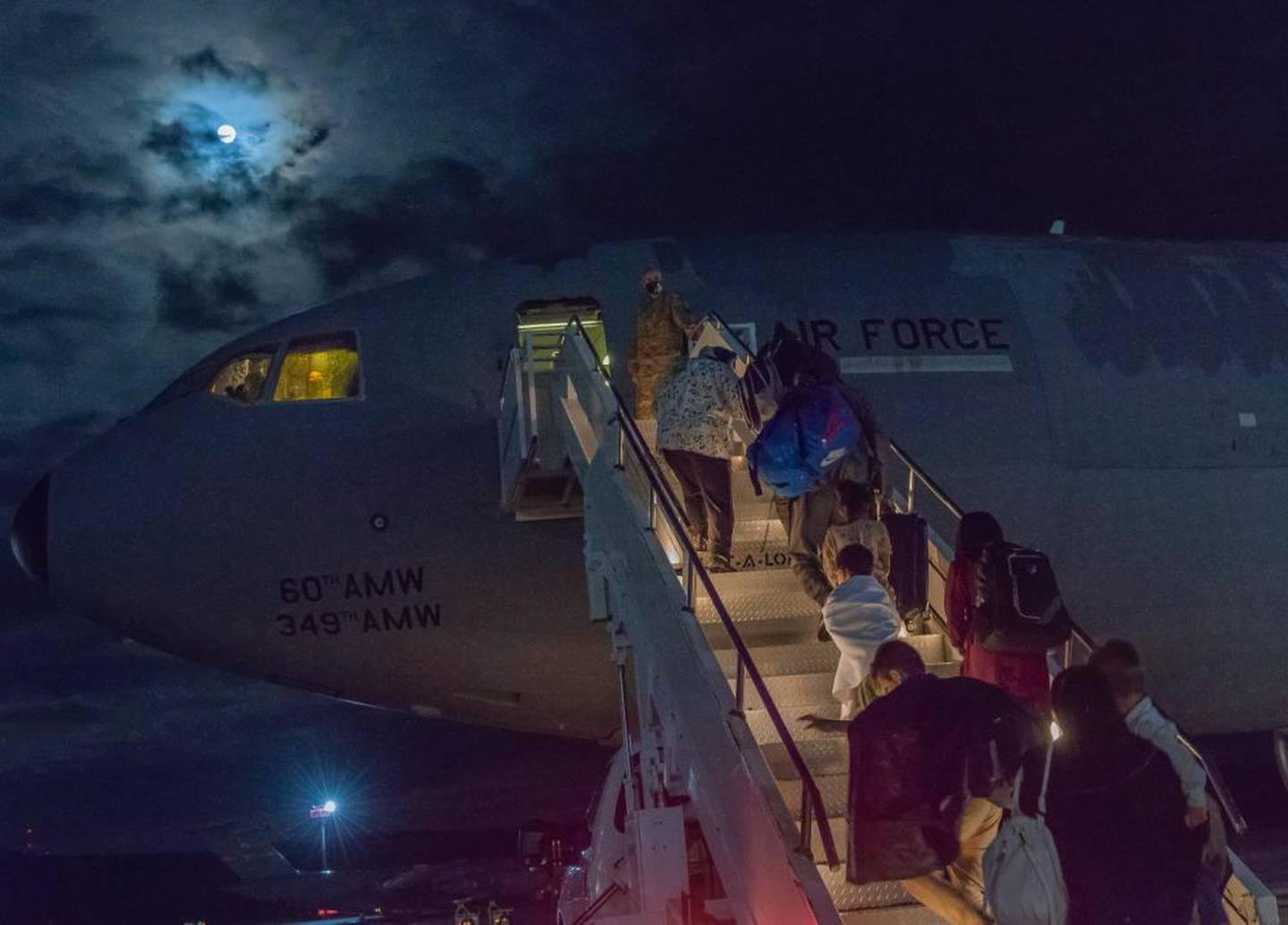 Just after midnight on Aug. 23, 2021, the first group of evacuees from Afghanistan who stayed at Ramstein Air Base, Germany, left for the United States on a military transport jet. (Air Force)  8 US bases in Europe prepared to accept as many as 25,000 Afghan refugees