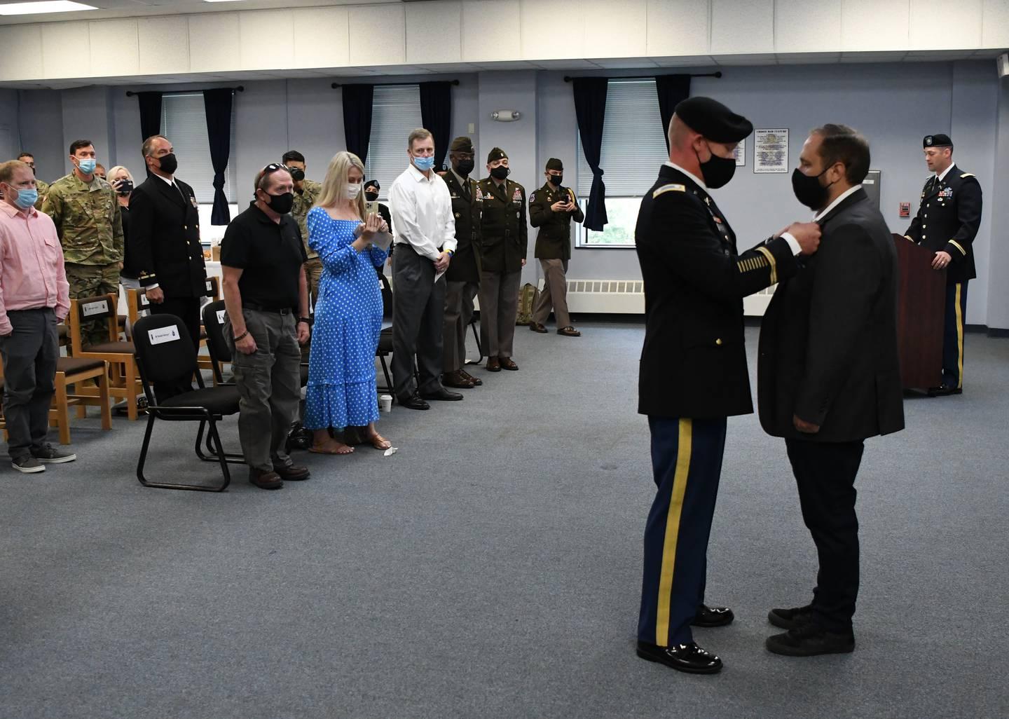Retired Sgt. Adam Holroyd, assigned to 1st Battalion, 32nd Infantry Regiment, 3rd Brigade Combat Team, was awarded the Silver Star during a ceremony Sept. 1 at Fort Drum. Lt. Col. Scott Horrigan, former 1-32 Infantry comma A dozen years later, this 10th Mountain vet receives Silver Star