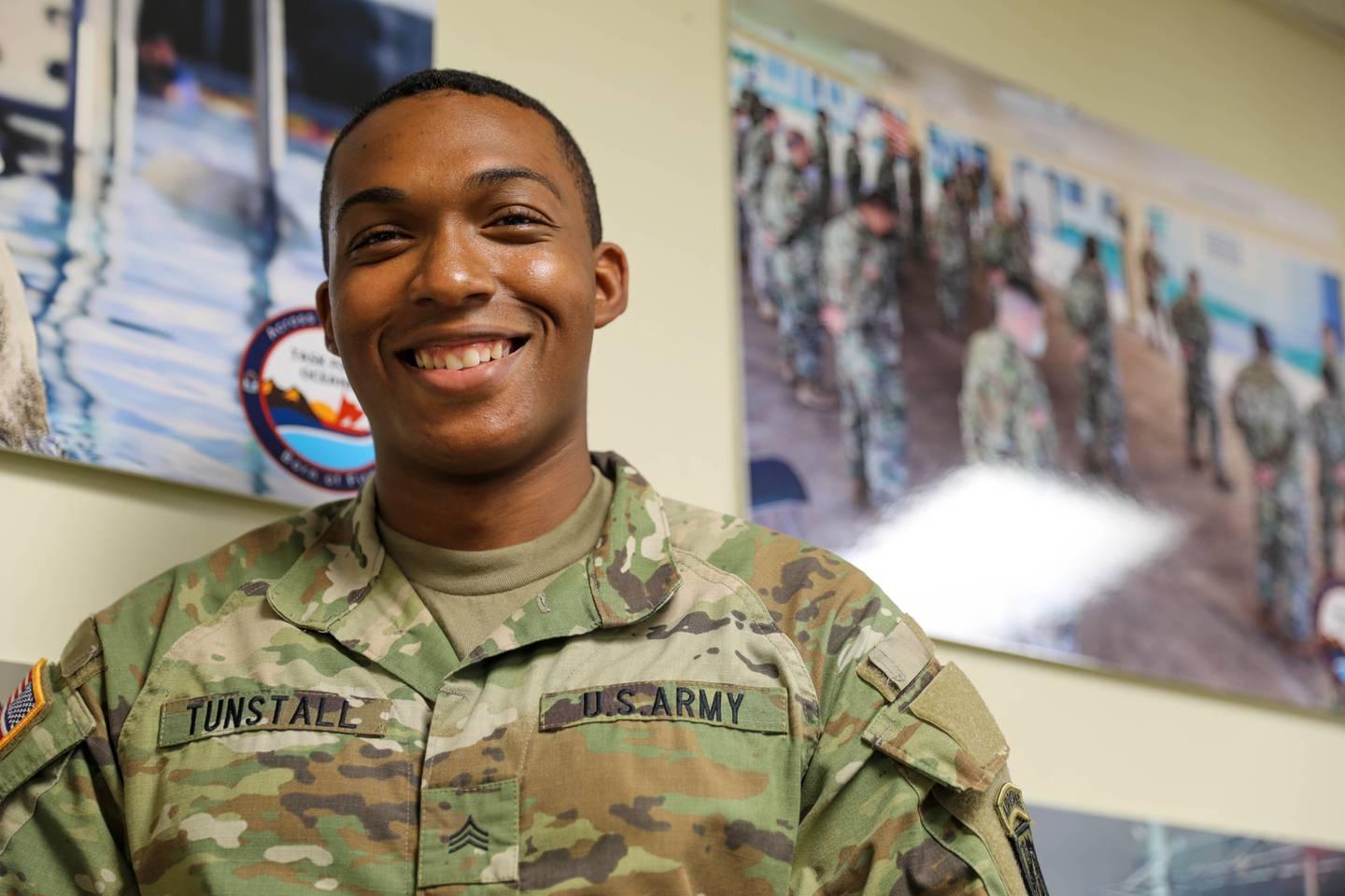 Army Sgt. Anthony Tunstall assigned to Task Force Oceania, 9th Mission Support Command. (Army) Soldier revives drowned child while on tour in Hawaii