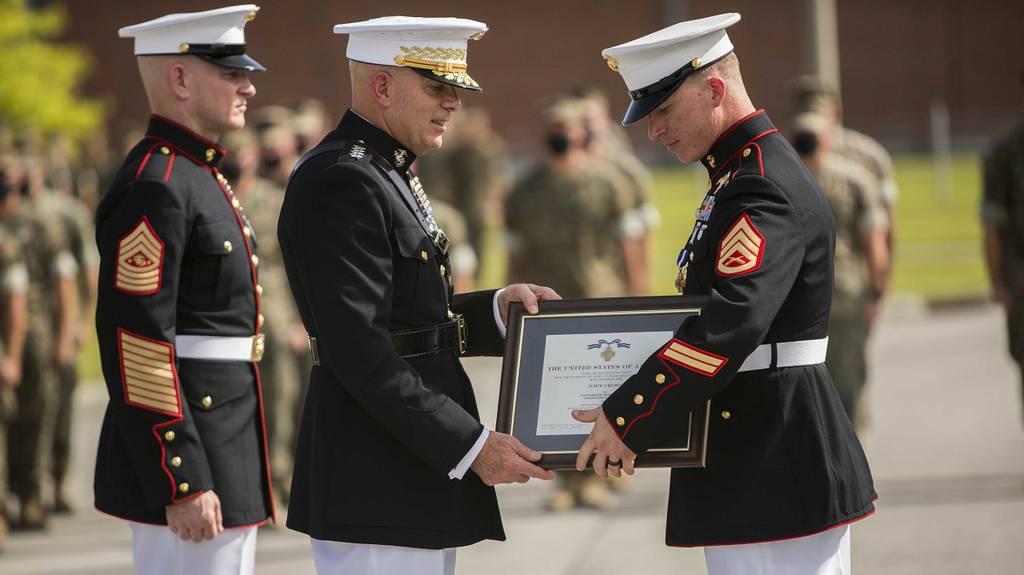Former Staff Sgt. Nicholas J. Jones, critical skills operator, was awarded the Navy Cross by the Commandant of the Marine Corps Gen. David Berger during a ceremony aboard Marine Corps Base Camp Lejeune, North Carolina, Aug