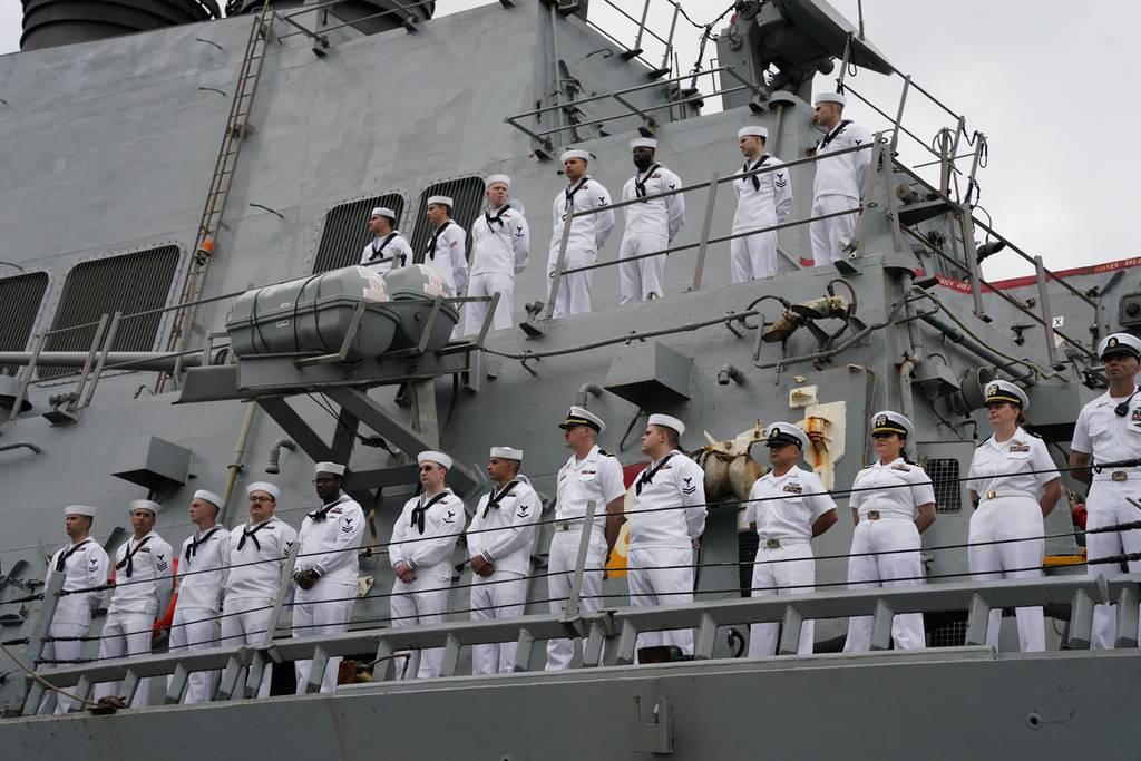 Sailors man the rails of the guided-missile destroyer Mitscher as the ship returns to Naval Station Norfolk to end their nine-month deployment. (MC1Joshua D. Sheppard/Navy) The Navy is hunting for â€˜coachesâ€™ to enhance sailorâ€™s professional, personal growth