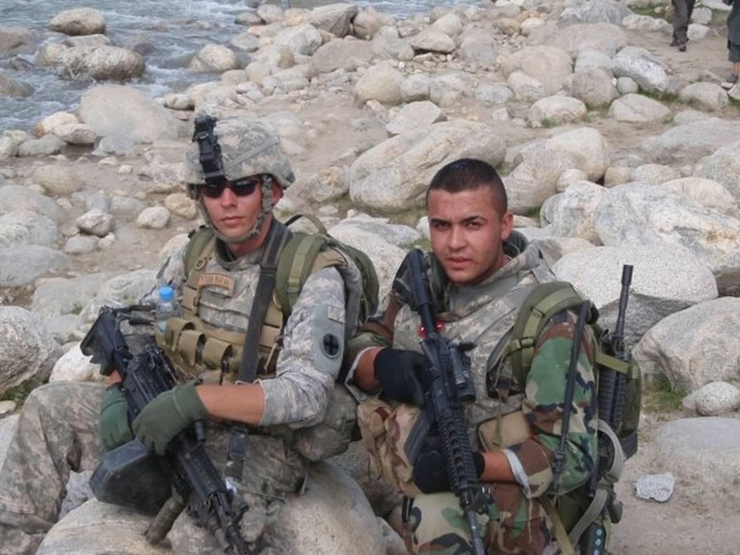 Marine Cpl. Jason Essazay on patrol with the Army in Afghanistan in 2008, taken while he was still working as an interpreter. (Cpl. Jason Essazay)