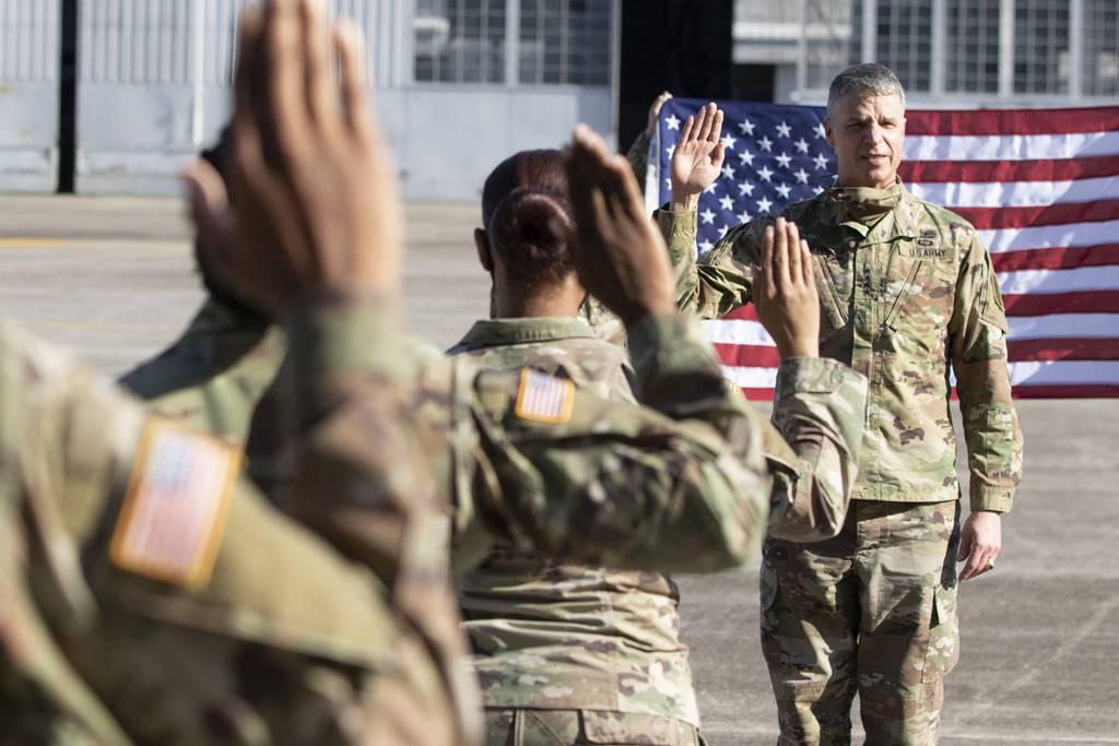 Army Vice Chief Gen. Joseph Martin leads a reenlistment ceremony for soldiers on Hunter Army Airfield, Ga., March 10, 2021. (Sgt. Andrew McNeil/Army) Army hits end-strength goals through high retention, lower basic training attrition