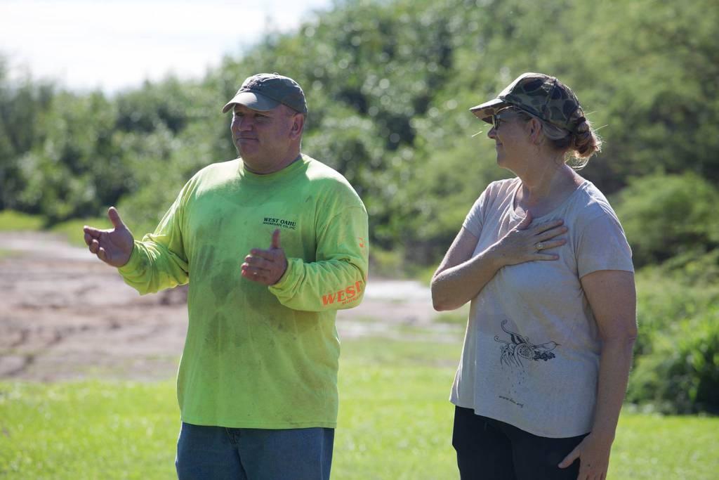 Retired Navy Seabee Tony Chance with HOH808 co-founder and executive director Sandy Ward in September 2018 at Kapapapuhi Point Park after one of HOH808's monthly community workdays. Here, he sings 