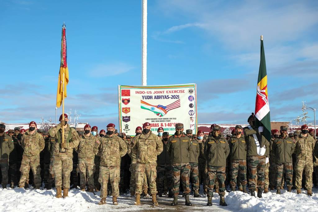 U.S. paratroopers with the 4th Infantry Brigade, 25th Infantry Division, and Indian Army troops from 7th Battalion, Madras Regiment, pose for a group photo during an opening ceremony for exercise Yudh Abhyas 21 Oct., 15, 2 US and Indian soldiers met for a mock UN mission, counter-drone and high altitude training