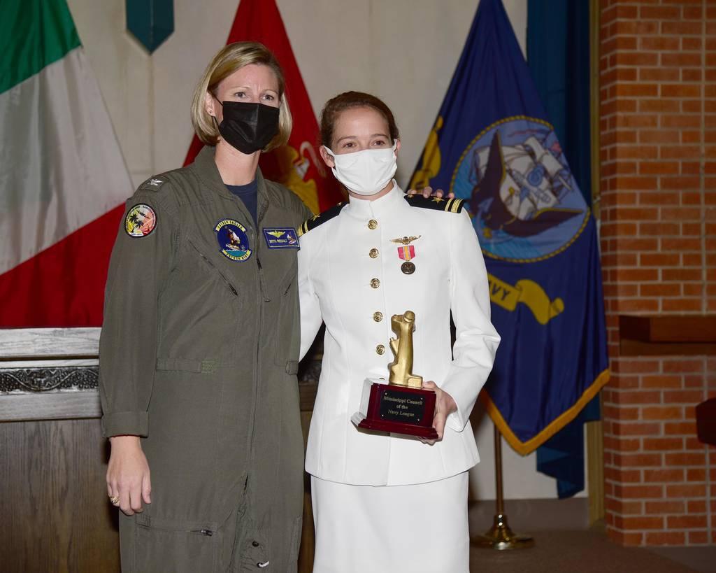 Capt. Beth Regoli, left, joins Lt. j.g. Suzelle Thomas following Thomasâ€™ naval aviator winging ceremony at Naval Air Station Meridian Oct. 29. Regoli, Thomasâ€™ mentor, passed her Wings of Gold to Thomas. (Penny Randall/ Navy selects first woman to go directly into flying the F-35C after earning her wings