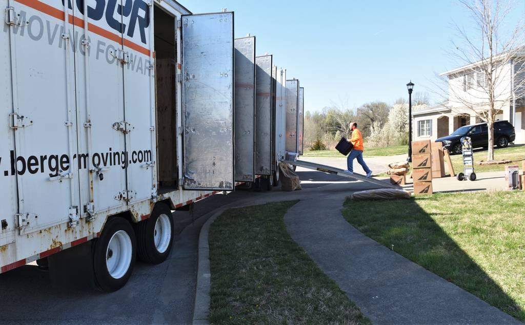 Movers load a Fort Knox family