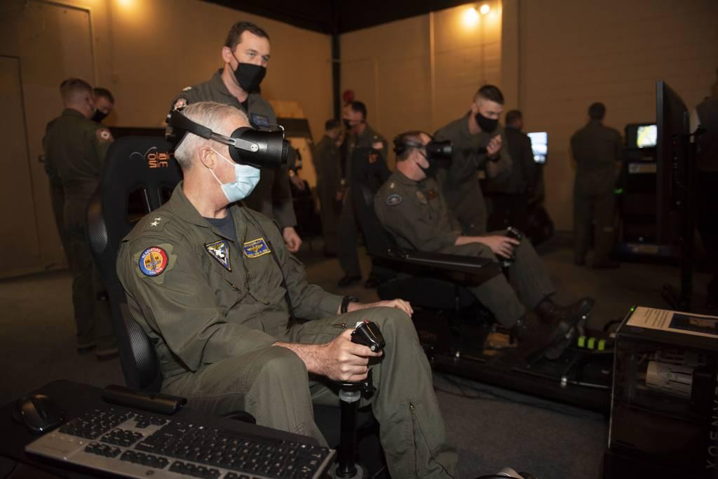 Commander of Naval Air Force Atlantic Rear Adm. John Meier conducts a virtual reality training flight during a Naval Aviation Next - Project Avenger demonstration at Training Air Wing 4, Naval Air Station Corpus Christi, o