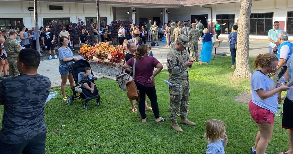 Military relief societies are providing financial assistance to families in Hawaii affected by fuel contamination in the Navy's water system. Here, families wait in line at the Aliamanu Military Reservation Community Cente Military charities step up to assist families affected by tainted water in Hawaii