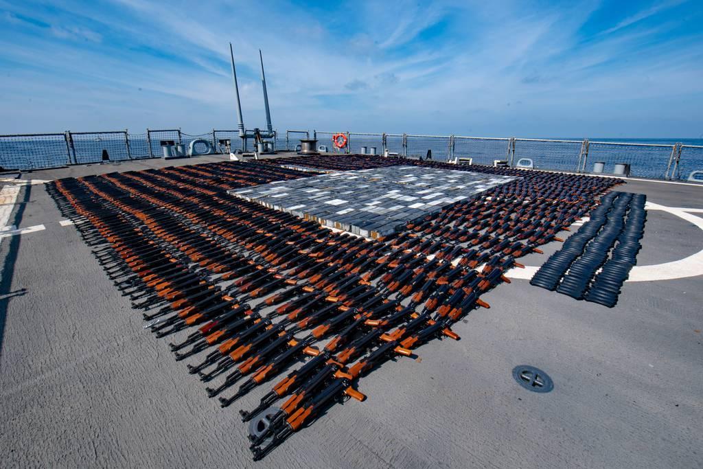 Illicit weapons seized from a stateless fishing vessel in the North Arabian Sea are arranged for inventory aboard the destroyer Oâ€™Kaneâ€™s flight deck Dec. 21, 2021. (MCSN Elisha Smith/Navy) Weapon, illicit drug seizures in U.S. 5th Fleet skyrocketed in 2021