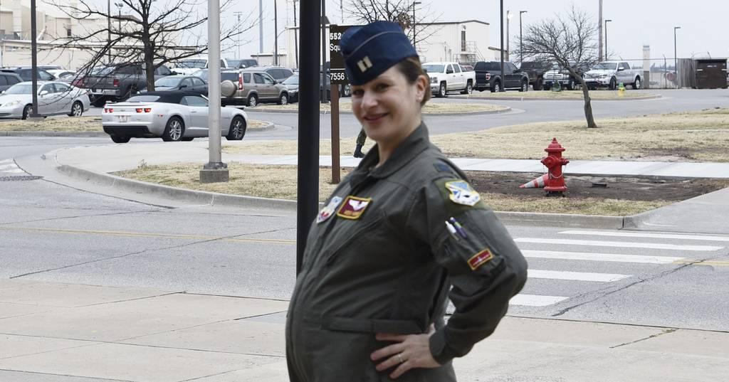 Then-expectant mother and Air Force Capt. Beatrice Horne helps the Air Force test out a new flight suit prototype that will accommodate pregnancy. (DoD)