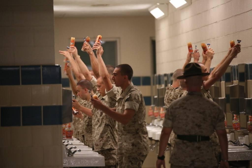 Marines are required to shave every day while they are in uniform. Above, recruits of Platoon 3061, Lima Company, 3rd Recruit Training Battalion hold up shaving gel and razors before beginning their day on Parris Island S. Corps will stop punishing Marines who canâ€™t shave due to razor bumps