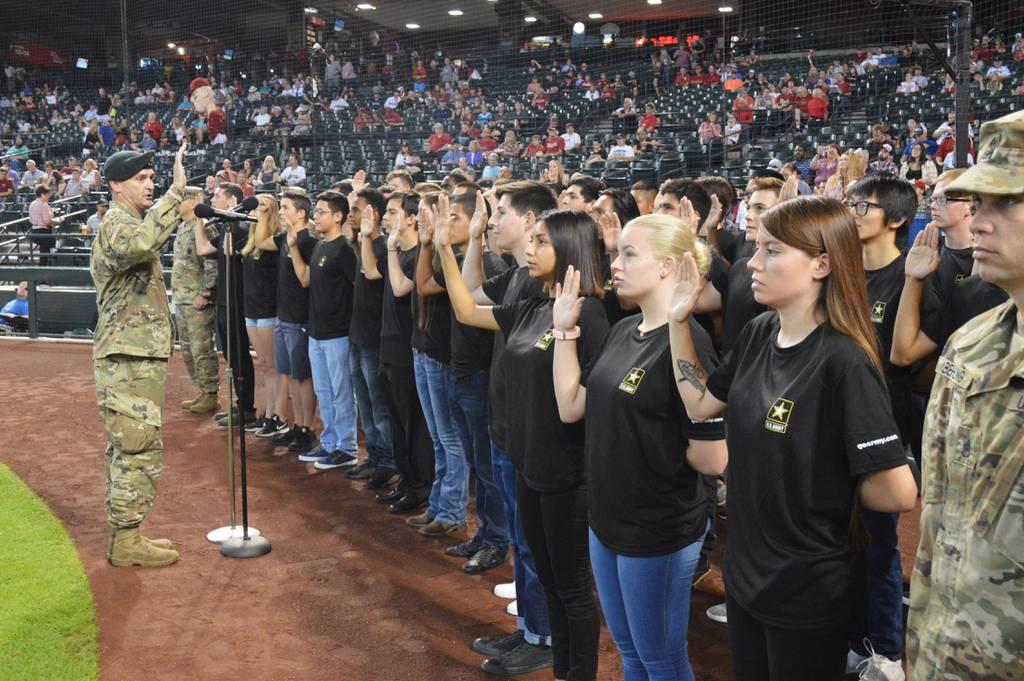 Lt. Col. Scott Morley, commander, Phoenix Recruiting Battalion, administers the oath of enlistment to 40 Future Soldiers from the battalion, Aug. 26, 2018, at Chase Field, Phoenix. (Army/Mike Scheck) Army expands two-year enlistment options as new screenings kick in