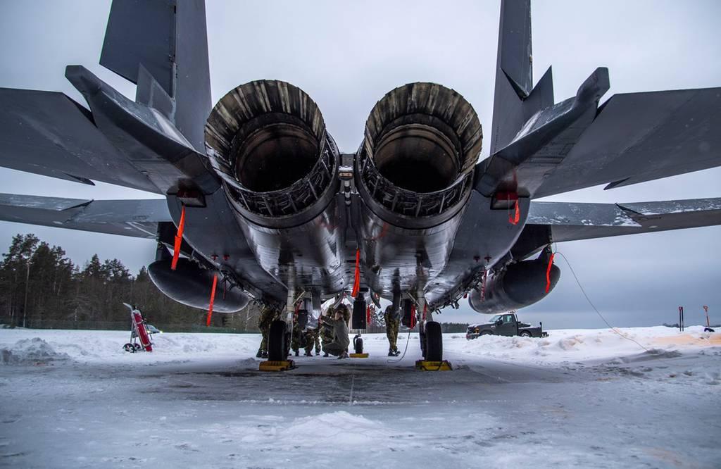 Capt. Matthew Taylor, a 336th Fighter Squadron pilot from the 4th Fighter Wing at Seymour Johnson Air Force Base, N.C., explains the capabilities of an F-15E Strike Eagle to Estonian joint terminal attack controllers durin â€˜Lead wingâ€™ plan for Air Force deployments takes shape at nine bases