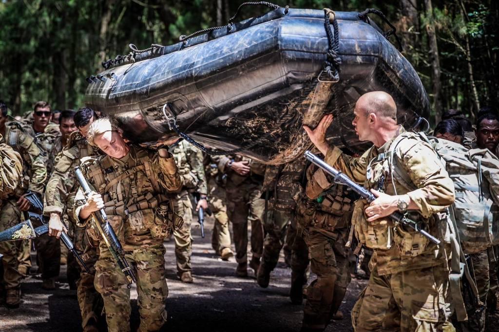 Soldiers in training haul rubber boat. (Spc. Jessica Scott/Army) Your Military Army launches first service-wide â€˜Best Squadâ€™ competition
