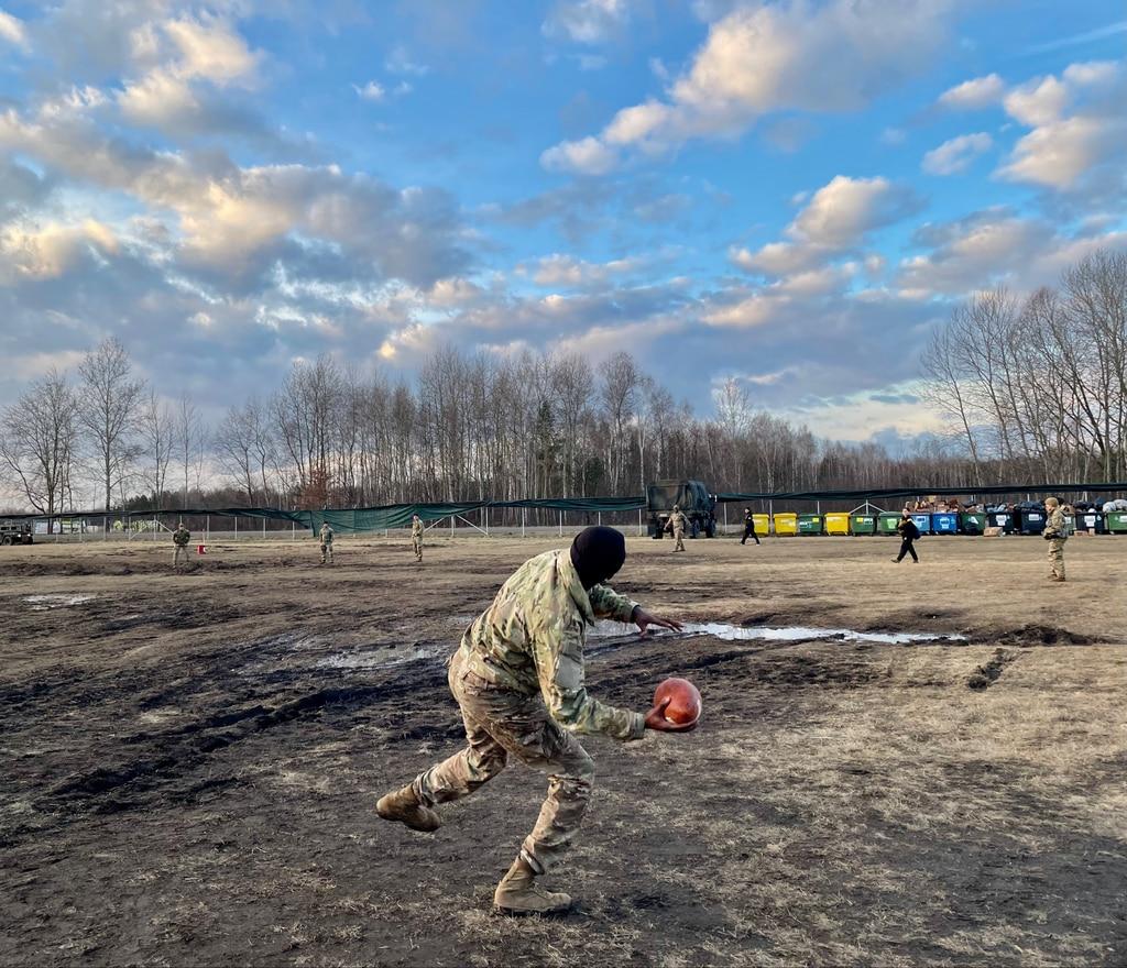 Troops play football at a location in Eastern Europe with equipment provided by the USO. (Photo courtesy USO)  Bringing line dancing, blankets and phone calls to Eastern Europe â€” itâ€™s what USO does