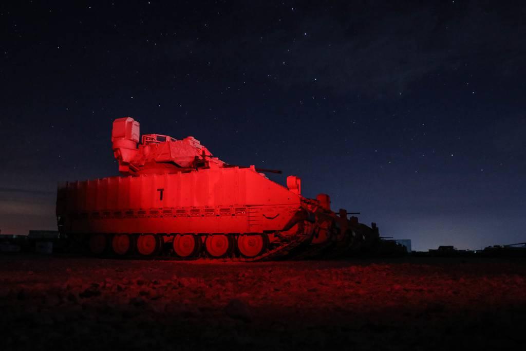 Soldiers from 1/163rd Combined Arms Battalion unload M2A3 Bradley Fighting Vehicles off a U.S. Air Force C-17 Globemaster in northeast Syria on Jan. 31, 2022. (Spc. William Gore/Army) US military changes explanation of attack on base in Syria