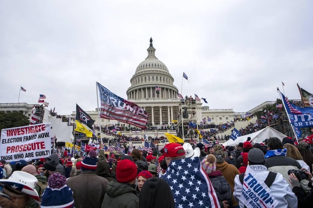FILE - Rioters rally at the U.S. Capitol in Washington on Jan. 6, 2021. (Jose Luis Magana/AP, File)