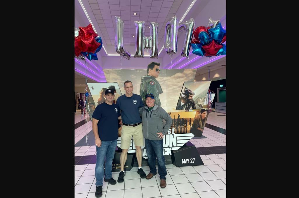 Capt. Judd Krier, center, the commanding officer of the amphibious assault ship Iwo Jima, took his entire crew to see Top Gun: Maverick last month. (Facebook) Iwo Jima CO took his 700-man crew for a ‘Top Gun: Maverick’ movie night, popcorn included