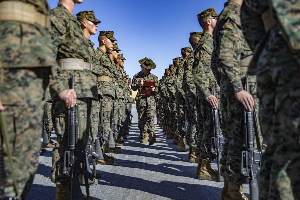 Thumbnail: Marine Corps drill masters inspect a platoon during practice at Marine Corps Recruit Depot San Diego on March 1, 2022. (Cpl. Grace J. Kindred/Marine Corps)