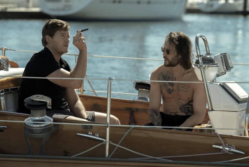 This image released by Amazon Studios shows Chris Pratt, left, and Taylor Kitsch in a scene from the series 
