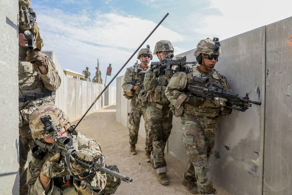 Soldiers with 1st Cavalry Division maneuver in training at the National Training Center, Fort Irwin, Calif. (Staff Sgt. Chris Hammond/Army)