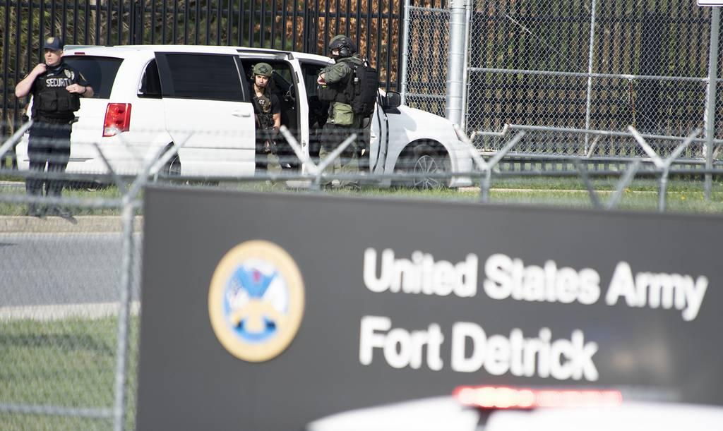 Frederick Police Department officers prepare to enter Fort Detrick during an April 2021 shooting. A recent DoD inspector general report found inconsistencies in the way military installations train for active shooter situa
