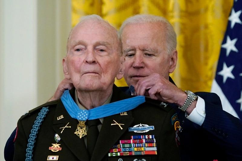 Enlarge President Joe Biden presents the Medal of Honor to retired U.S. Army Col. Ralph Puckett... 
