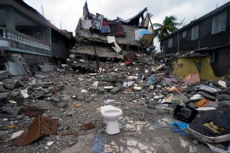 Enlarge A building in Les Cayes, Haiti, lies in ruins Tuesday, three days after a 7.2-magnitude... 